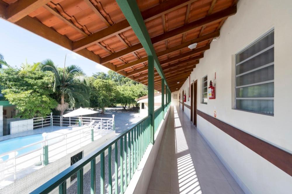 Quarto Triplo com Vista para a Piscina